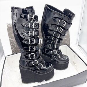 Demonia Platform Patent Buckle Boots